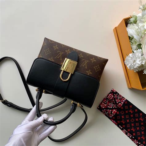 top handle Louis Vuitton bag